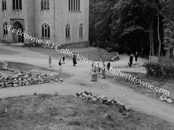 GROUNDS OF BISHOP'S HOUSE, WITH BISHOP & FRIENDS